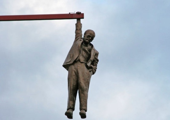 The Statue of a Man hanging by one hand - Sigmund Freud