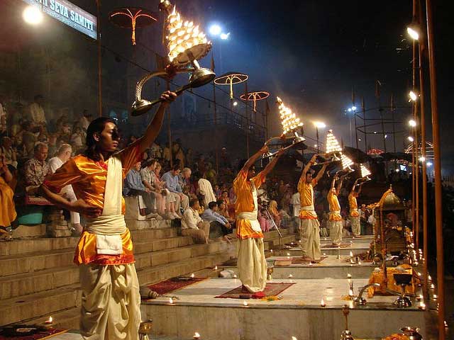 Varanasi -  The City of Life and Death - Brahmin performs arati