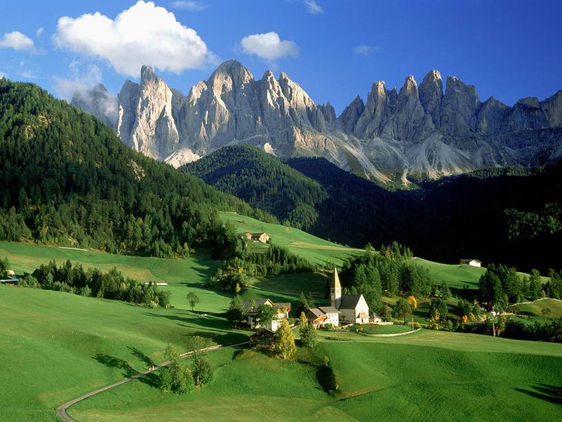 Italy  - Outlines of the mountains in a greenish landscape