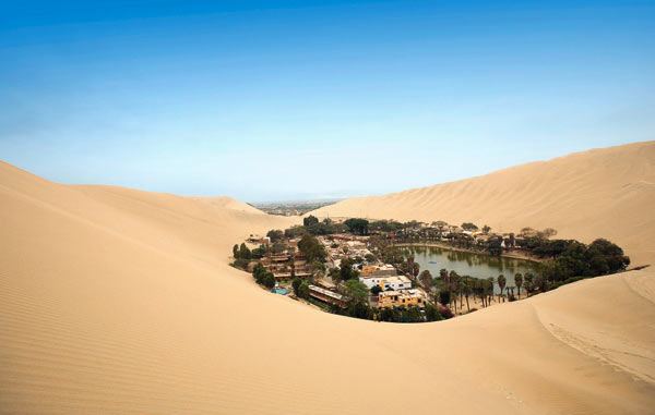 Huacachina in Peru - A verdant spot in the middle of the desert