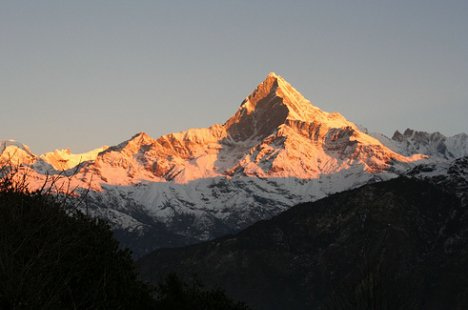 Machapuchare, Himalaya Mountains in Nepal - Beautiful sunset over Machapuchare