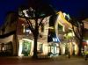 picture The house at night Crooked House in Sopot, Poland